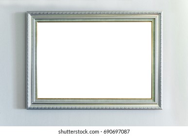 The Blank Ornate Picture Frame On The Wall