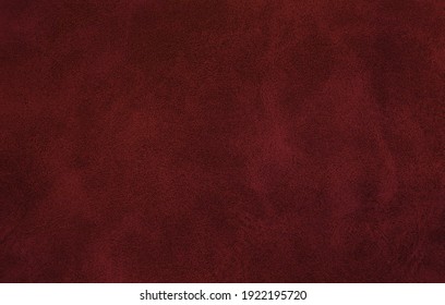 blank page of leather texture background with rough and grunge skin, full frame. Close up detail of textured sheet of dark red color organic art background. background of rough fabric red color.