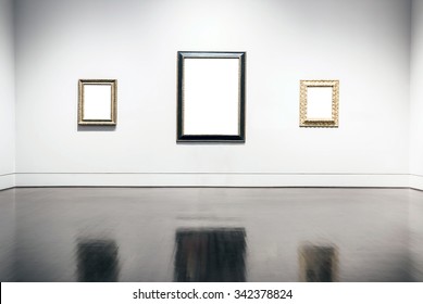 Blank Painting Frames In Art Gallery.