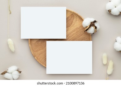 Blank paper cards, Greeting card Mockup with pampas grass on a wooden plate, beige background, Minimal beige workplace composition, flat lay, mockup - Powered by Shutterstock