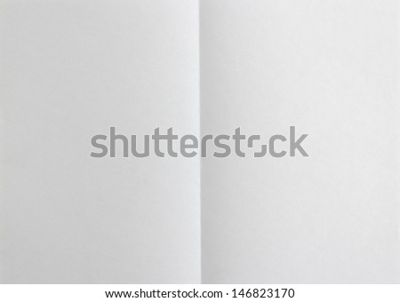 Blank paper folded on two. Background