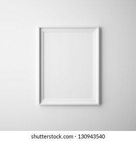 blank paper frames on white wall - Shutterstock ID 130943540