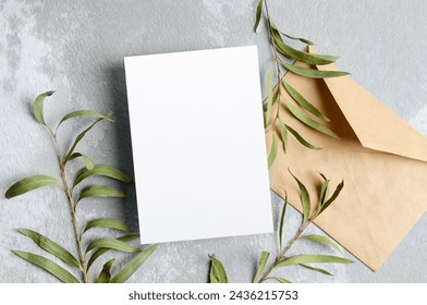 Blank paper invitation card mockup with botanical decor, white card mock up with copy space