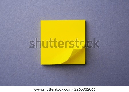 Blank paper note on color background, top view