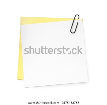 Blank paper notes attached with clip isolated on white, top view