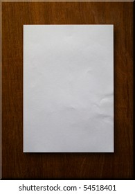 Blank paper on wood board background