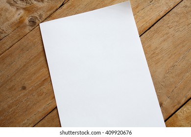 Blank Paper On Wood Table