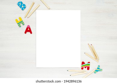 Blank Paper Sheet, Coloring Page, Kids Worksheet Mockup, Flat Lay With Pencils And Colorful Letters.