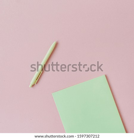 Blank paper sheets with empty copy space for text, pen on pink background. Flat lay, top view.