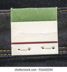 Blank Paper Tag On Denim Background