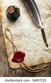 Blank paper with wax seal, quill & ink