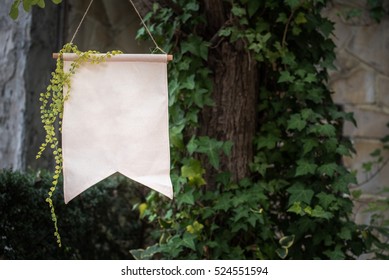 Blank Party Flag With Ivy In Garden For Montage Text