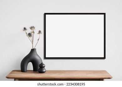 Blank picture frame mockup on a wall. Landscape orientation. Artwork template in interior design - Shutterstock ID 2234308195