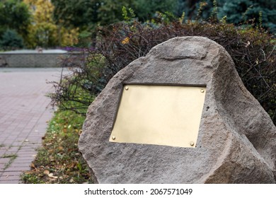 Blank Plaque On The Stone. Bronze Memorial Plaque In The Park. Empty Sign Board On The Wall.