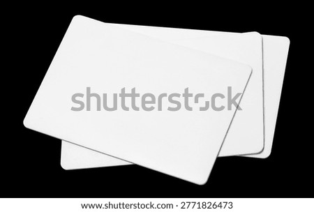 Blank plastic cards mockup stack, isolated on black background