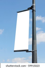 Blank Poster On Lamppost With Blue Sky