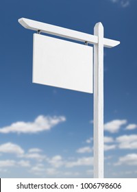 Blank Real Estate Sign Over A Blue Sky with Clouds. - Shutterstock ID 1006798606