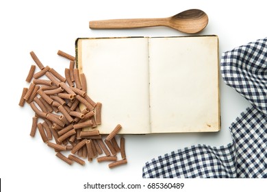 Blank Recipe Book And Italian Pasta Isolated On White Background. Top View.