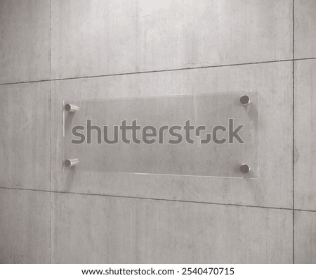 Blank rectangular sign  on concrete wall suitable for graphic design projects, urban backgrounds, advertising mockups, and signage concepts.