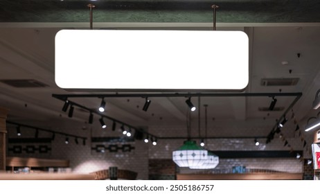 Blank rectangular sign with white space for mockup information hanging from ceiling inside modern retail store.