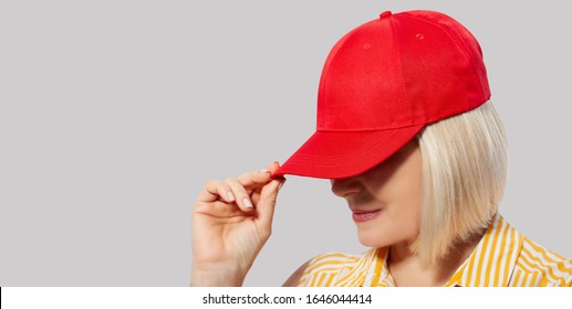 Blank Red Baseball Cap Mockup Template, Wear On Women Head, Isolated, Clipping Path Closeup. Woman In Clear Hat And T Shirt Mock Up Holding Visor Of Caps. Cotton Basebal Cap Mokcup On Delivery Guy.