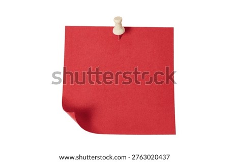 blank red sticky note for notifications or reminder with wooden push pin and curled up edge isolated on white