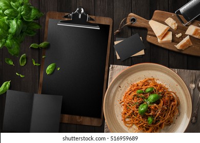 Blank Restaurant Menu Template On Dark Wood Table, With Pasta, Basil Cheese, Top View.