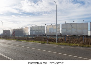 Blank Road Billboard For Advertising.
No People Are Visible, Shot Is Taken In Daylight.