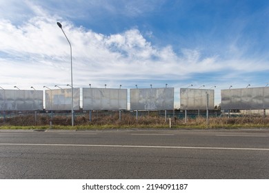 Blank Road Billboard For Advertising.
No People Are Visible, Shot Is Taken In Daylight.