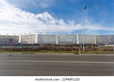 Blank Road Billboard For Advertising.
No People Are Visible, Shot Is Taken In Daylight.