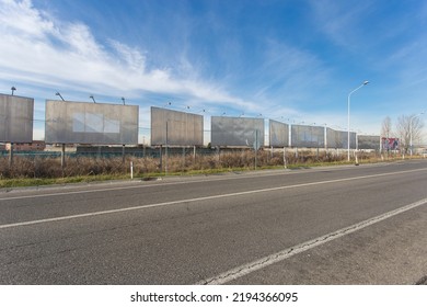 Blank Road Billboard For Advertising.
No People Are Visible, Shot Is Taken In Daylight.