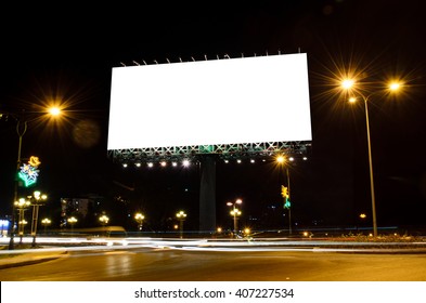 Blank Roadside Billboard At Night In The City.