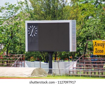 Blank Score Board And Clock At Football Stadium.Outdoor Sport.