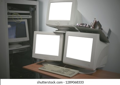 Blank Screen Computer Monitors With Copy Space On The Table In The Server Room.