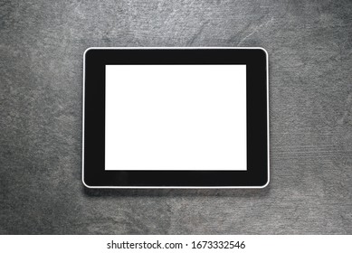 Blank screen digital tablet computer with copy space on black background.