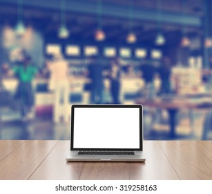 Blank Screen Laptop Computer With Blur Coffee Shop Background