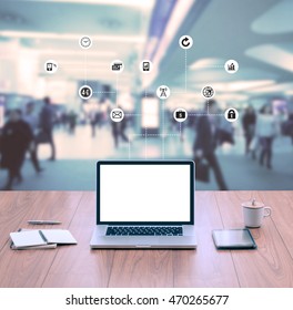 Blank screen laptop computer with blur business people background - Shutterstock ID 470265677