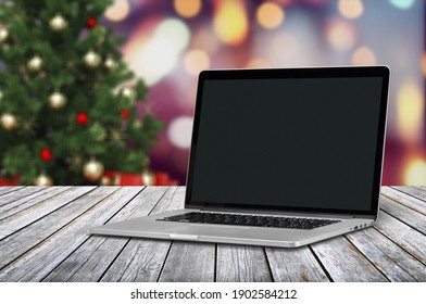 Blank Screen Laptop On Christmas Background. Happy Hour Party Online