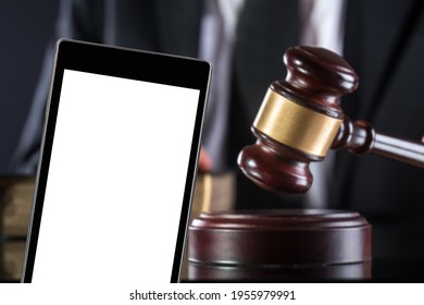 Blank screen on the smartphone placed next to the judge's gavel.