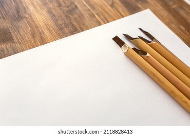 Blank Sheet Of Paper With Traditional Arabic Kalams For Calligraphy