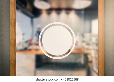 Blank Sign On Glass Door With Coffee Shop Background