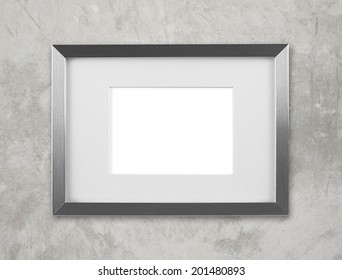 Blank Silver Picture Frame On The Wall