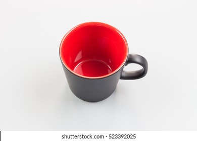 blank single coffee cup. Red glass on white background. Ceramic cup top view - Powered by Shutterstock