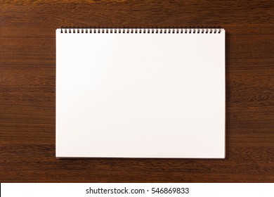 Blank Sketchbook On A Desk 