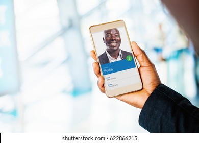 Blank Smartphone Screen. Dark Skin Hand Holding A Phone