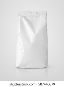 Blank Snack White Paper Bag Package On Gray. Plastic Packaging With Clipping Path