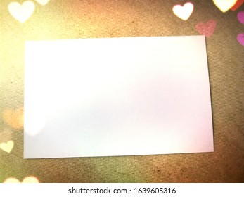 Blank space on a rectangle shape of white paper on brown background