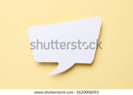 Blank speech bubble on beige background. Space for text