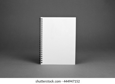 Blank Spiral Notebook On Gray Background. Template For Your Design