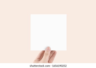 Blank Square Paper with hand mock up